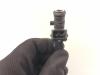 Injector (petrol injection) from a Opel Corsa D 1.4 16V Twinport 2008