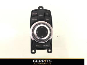 Used MMI switch BMW 5 serie (F10) 520d 16V Price € 82,48 Margin scheme offered by Gerrits Automotive