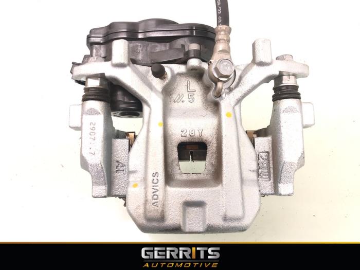 Gebrauchte Bremszange links hinten Toyota Corolla Cross 2.0 VVT-i 16V Hybrid 200 Preis € 199,99 Margenregelung angeboten von Gerrits Automotive BV