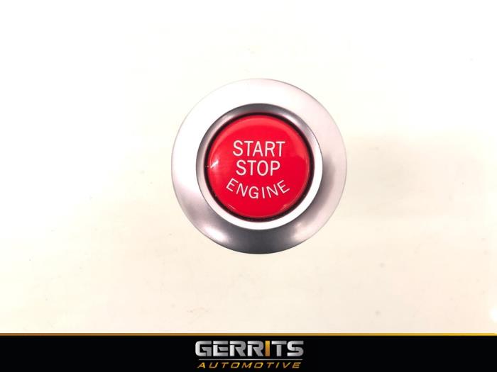 Start/stop switch from a BMW 1 serie (E81) 123d 16V . 2008