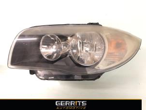 Used Headlight, left BMW 1 serie (E81) 123d 16V . Price € 59,99 Margin scheme offered by Gerrits Automotive