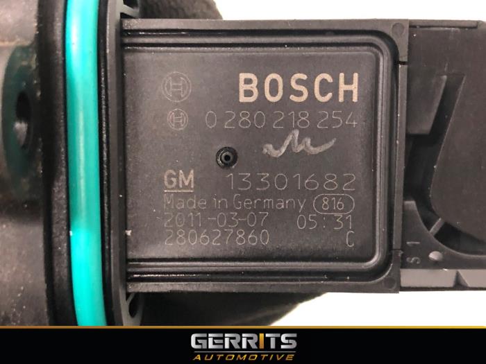Air mass meter from a Opel Astra J (PC6/PD6/PE6/PF6) 1.4 Turbo 16V 2011