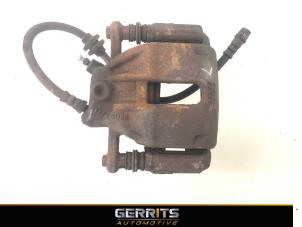 Used Front brake calliper, left Renault Clio III (BR/CR) 1.5 dCi FAP Price € 19,99 Margin scheme offered by Gerrits Automotive