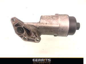 Używane Obudowa filtra oleju Opel Corsa D 1.2 16V Cena € 29,99 Procedura marży oferowane przez Gerrits Automotive
