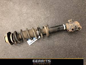 Used Front shock absorber rod, left Daihatsu Sirion 2 (M3) 1.3 16V DVVT Price € 34,99 Margin scheme offered by Gerrits Automotive