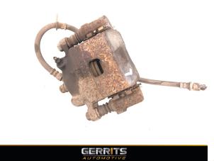 Used Front brake calliper, left Daihatsu Sirion 2 (M3) 1.3 16V DVVT Price € 24,99 Margin scheme offered by Gerrits Automotive