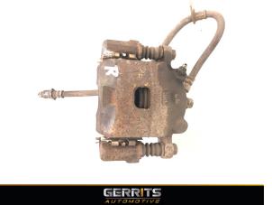 Used Front brake calliper, right Daihatsu Sirion 2 (M3) 1.3 16V DVVT Price € 24,99 Margin scheme offered by Gerrits Automotive