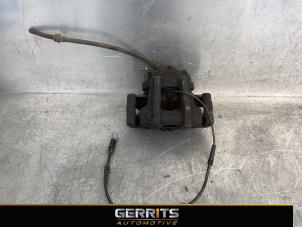 Used Front brake calliper, left BMW 1 serie (F20) 118i 1.6 16V Price € 24,99 Margin scheme offered by Gerrits Automotive