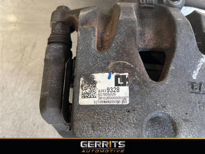 Front brake calliper, left from a Opel Karl 1.0 12V 2018