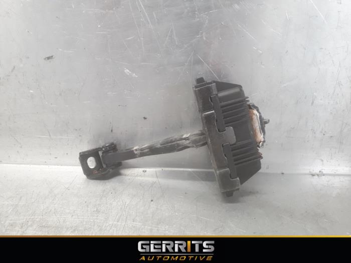 Door check strap stopper