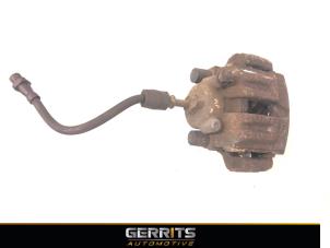 Used Rear brake calliper, left BMW 3 serie (E90) 318i 16V Price € 29,99 Margin scheme offered by Gerrits Automotive