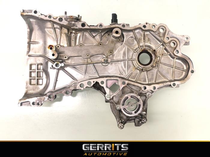 Timing cover from a Toyota Auris Touring Sports (E18) 1.8 16V Hybrid 2013
