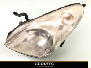 Used Headlight, left Nissan Pixo (D31S) 1.0 12V Price € 99,99 Margin scheme offered by Gerrits Automotive