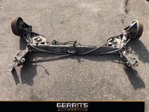 Used Rear-wheel drive axle Nissan Note (E11) 1.4 16V Price € 174,99 Margin scheme offered by Gerrits Automotive