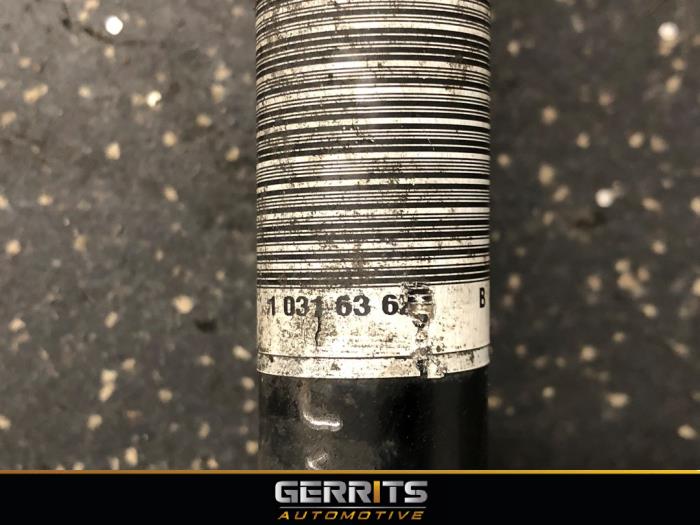 Front drive shaft, left from a Opel Corsa E 1.4 16V 2015