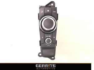 Used Navigation control panel Mazda 2 (DJ/DL) 1.5 SkyActiv-G 90 Price € 149,99 Margin scheme offered by Gerrits Automotive