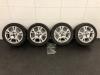 Set of wheels + winter tyres from a Ford Fiesta 6 (JA8), 2008 / 2017 1.25 16V, Hatchback, Petrol, 1.242cc, 60kW (82pk), FWD, SNJB, 2008-06 / 2017-04 2014