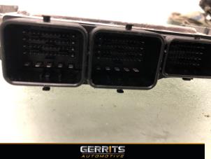 Engine management computer from a Ford Focus 3 Wagon 1.6 TDCi ECOnetic 2013
