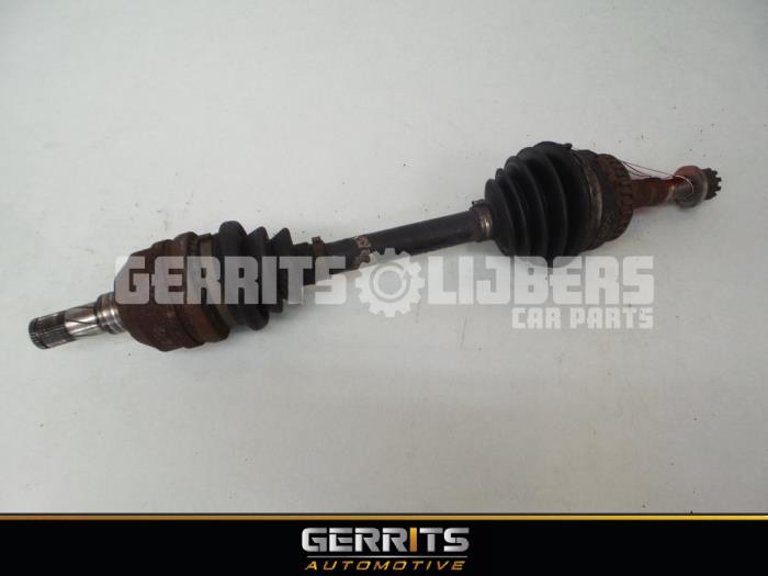 Front drive shaft, left from a Opel Vectra B (38) 2.0 Di 16V 1999