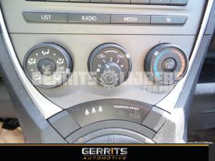 Używane Panel sterowania nagrzewnicy Subaru Trezia 1.33 16V Dual VVT-I Cena € 48,40 Procedura marży oferowane przez Gerrits Automotive