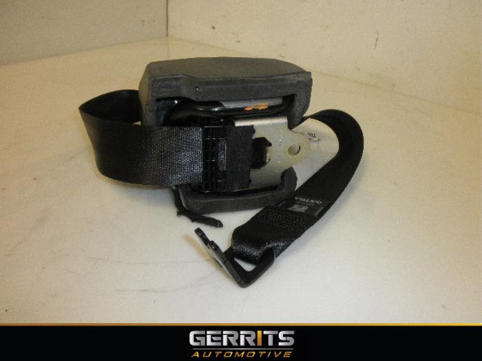 Rear seatbelt tensioner, left from a Volvo V40 (MV) 1.6 T2 GTDi 16V 2014