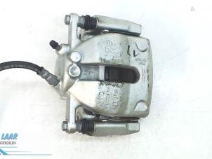 Used Front brake calliper, left Renault Kangoo/Grand Kangoo (KW) 1.5 dCi 110 Price on request offered by Autodemontage van de Laar