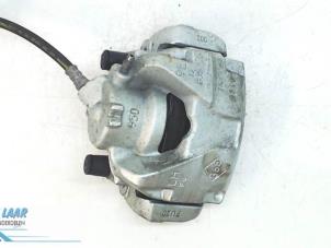Used Front brake calliper, left Dacia Duster (SR) 1.2 TCE 16V 4x4 Price on request offered by Autodemontage van de Laar
