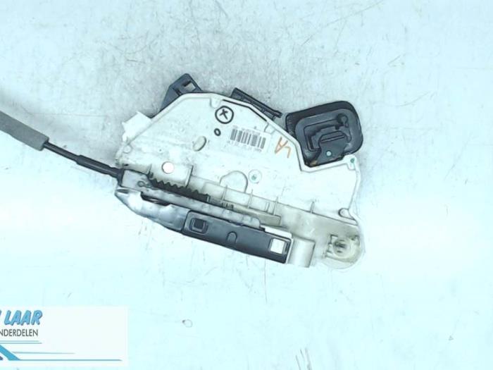 Rear door lock mechanism 4-door, left from a Volkswagen Polo V (6R) 1.4 16V 2010