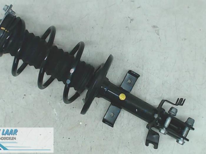 Front shock absorber rod, left from a Renault Clio IV (5R) 1.5 Energy dCi 90 FAP 2019