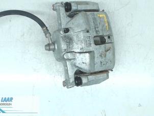 Used Front brake calliper, left Renault Kadjar (RFEH) 1.5 Blue dCi Price on request offered by Autodemontage van de Laar