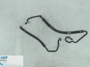 Used Power steering line Opel Astra H SW (L35) 1.7 CDTi 16V Price on request offered by Autodemontage van de Laar