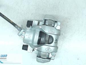 Used Front brake calliper, left Dacia Sandero II 0.9 TCE 12V Price on request offered by Autodemontage van de Laar