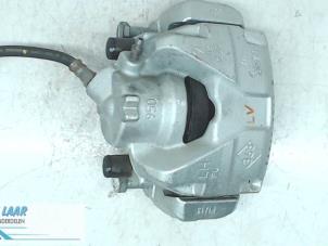Used Front brake calliper, left Dacia Duster (HS) 1.5 dCi 4x4 Price on request offered by Autodemontage van de Laar
