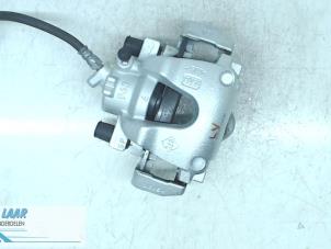 Used Front brake calliper, left Dacia Sandero II 0.9 TCE 12V Price on request offered by Autodemontage van de Laar