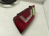 Taillight, left from a Volkswagen Up! (121) 1.0 12V 60 2014