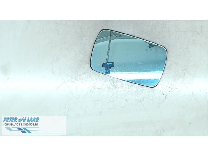 Mirror glass, left from a BMW 3 serie (E46/4) 318i 16V 2002