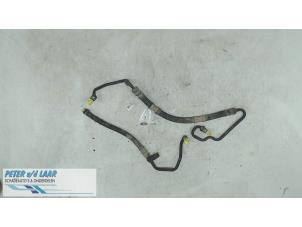 Used Power steering line Opel Astra H (L48) Price on request offered by Autodemontage van de Laar