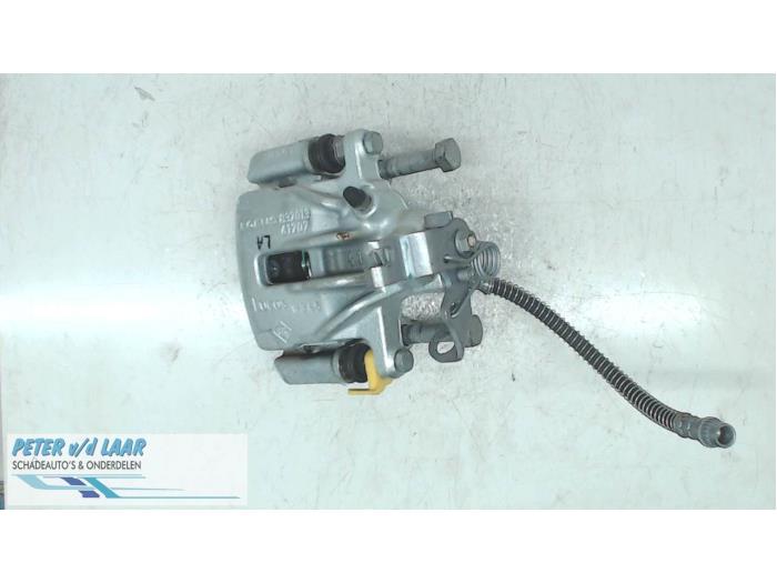 Rear brake calliper, left from a Renault Trafic Passenger (1JL/2JL/3JL/4JL) 1.6 dCi 120 Twin Turbo 2019
