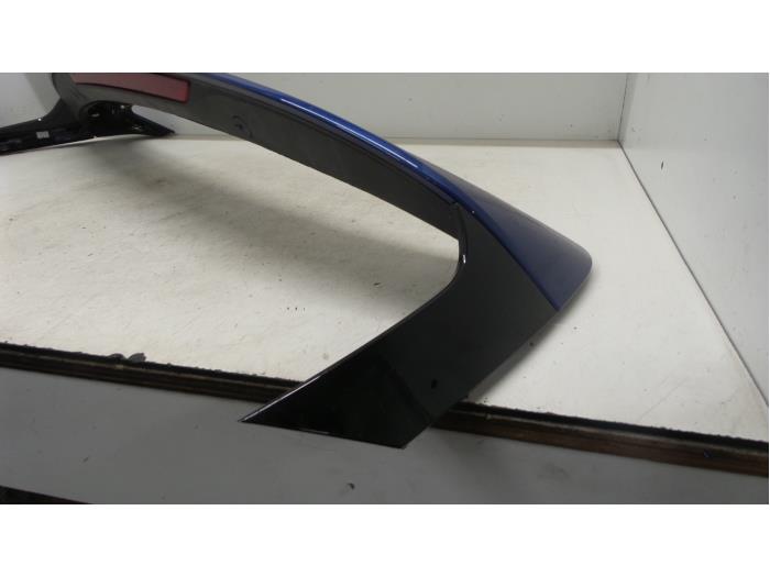 Spoiler tailgate from a Renault Clio V (RJAB) 1.0 TCe 100 12V 2019