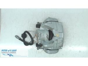 Used Front brake calliper, right Dacia Duster (SR) 1.2 TCE 16V Price on request offered by Autodemontage van de Laar