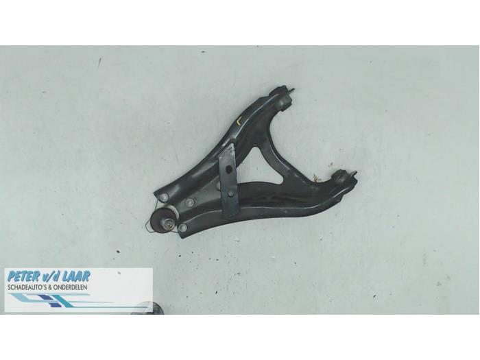 Front wishbone, left from a Dacia Duster (SR) 1.6 16V 2019