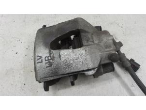 Used Front brake calliper, left Volkswagen Golf VI (5K1) 1.4 16V Price on request offered by Autodemontage van de Laar
