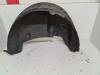 Wheel arch liner from a Volkswagen Polo IV (9N1/2/3) 1.4 16V 2006
