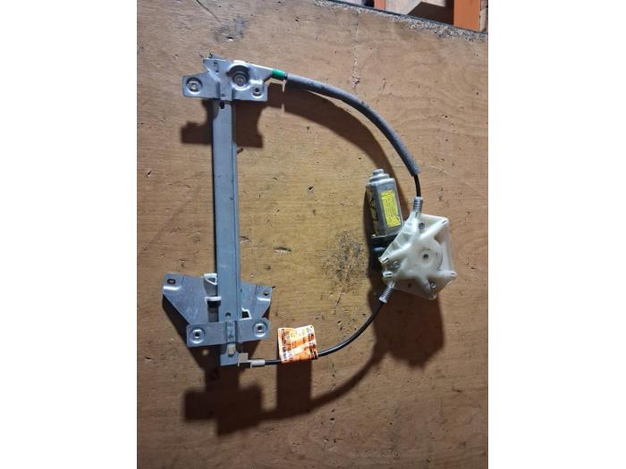 Door window regulator with motor