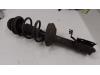 Front shock absorber rod, left from a Dacia Logan MCV (KS), 2007 / 2013 1.4, Combi/o, Petrol, 1.390cc, 55kW (75pk), RWD, K7J710; K7JA7, 2007-02 / 2013-05, KSDAE; KSRAE 2009