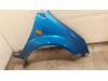 Front wing, right from a Ford Fiesta 5 (JD/JH), 2001 / 2009 1.4 16V, Hatchback, Petrol, 1.388cc, 59kW (80pk), FWD, FXJA; EURO4; FXJB, 2001-11 / 2008-10, JD; JH 2004