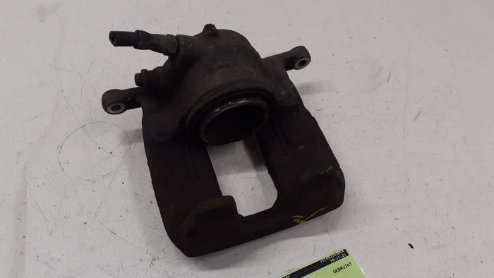 Front brake calliper, left from a Mercedes-Benz A (W176) 1.6 A-180 16V 2014