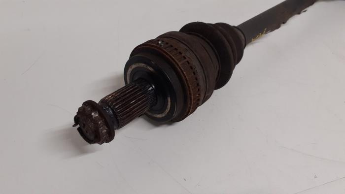Drive shaft, rear right from a BMW 1 serie (E81) 118i 16V 2008