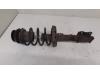 Front shock absorber rod, left from a Opel Astra G Caravan (F35) 1.6 16V 2000