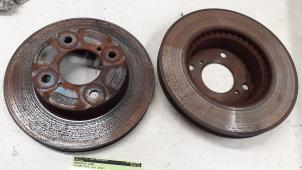 Used Front brake disc Nissan Pixo (D31S) 1.0 12V Price € 35,00 Margin scheme offered by Autodemontage van de Laar
